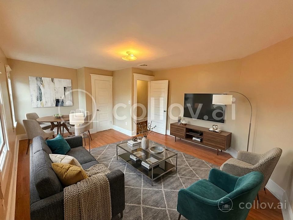 Staged Photo: Large room, can be living/dining.