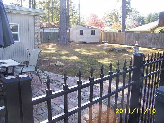 Iron fence in back