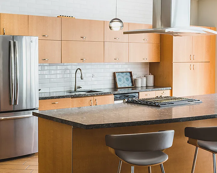 Soaring ceiling heights leave this open kitchen feeling more spacious