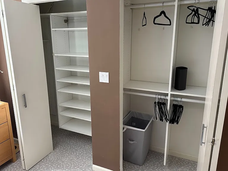 Ample storage with custom built-in closet organization systems.