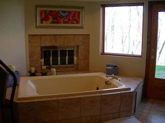 Sauna/spa room with fireplace