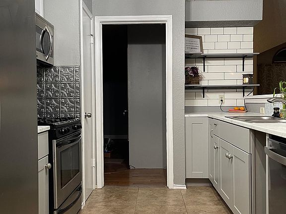 New cabinets, countertops and dishwasher.