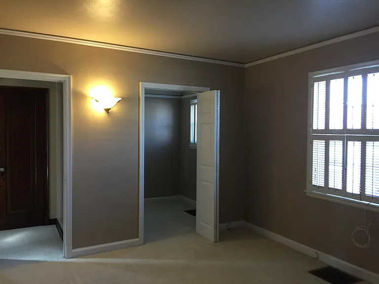 Bedroom with small attached multi purpose room