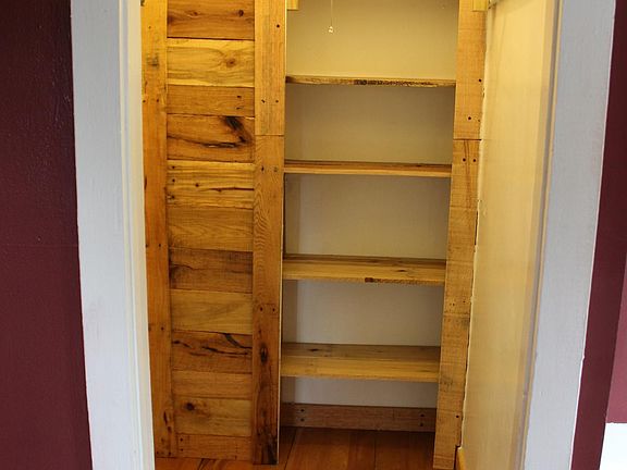 Inside of closet! Yes! the shelving stays for the next ten