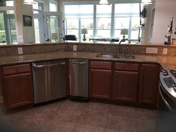 Kitchen overlooking family