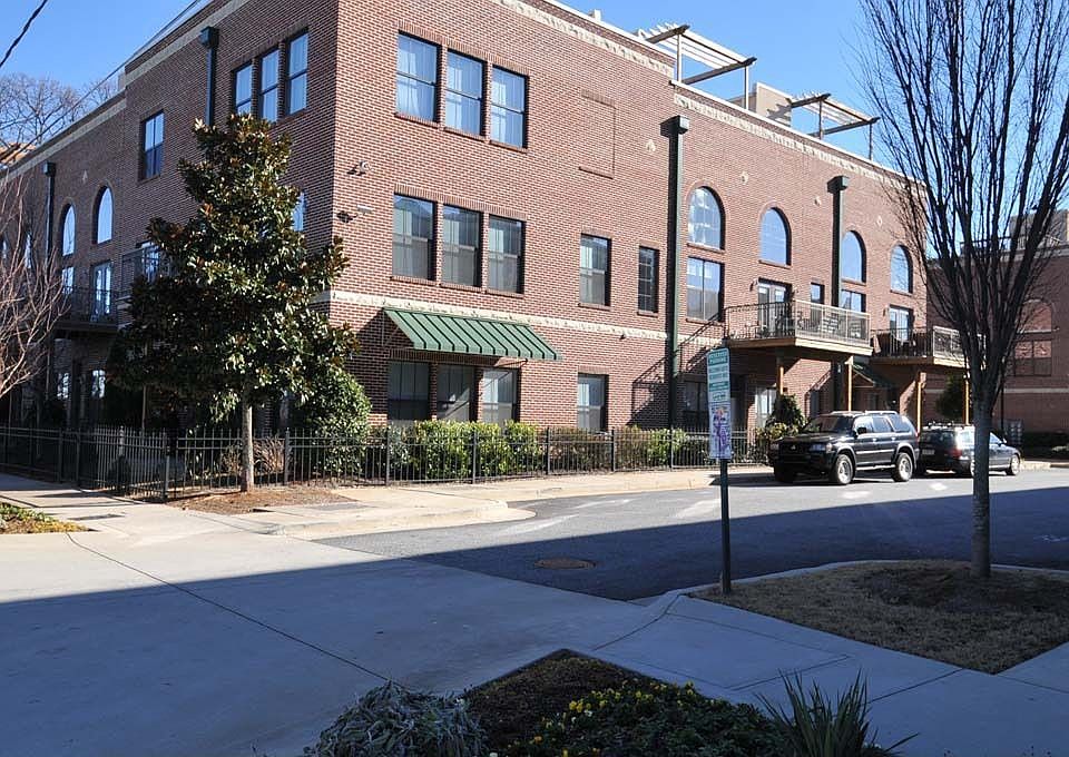 Exterior view - corner unit occupying 2nd, 3rd and rooftop levels.