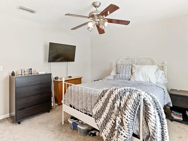 Primary Bedroom *NOTE: floors have been updated with new laminate flooring, not pictured*