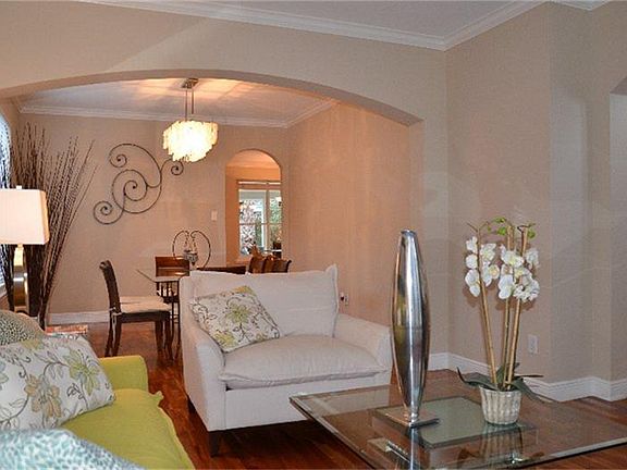 Another view of the formal living room looking into the formal dining room.