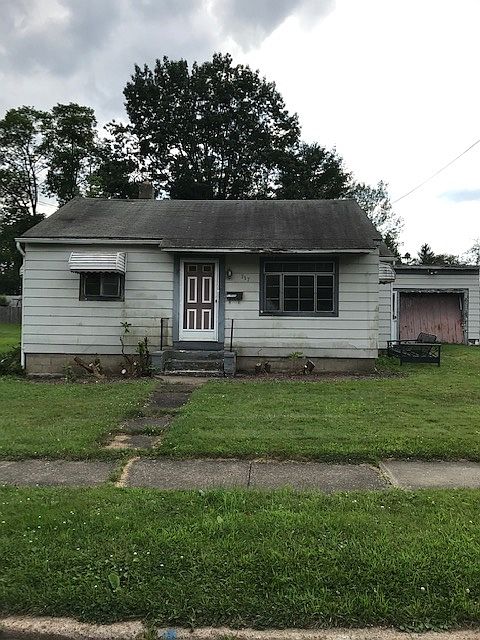 Front of house and garage