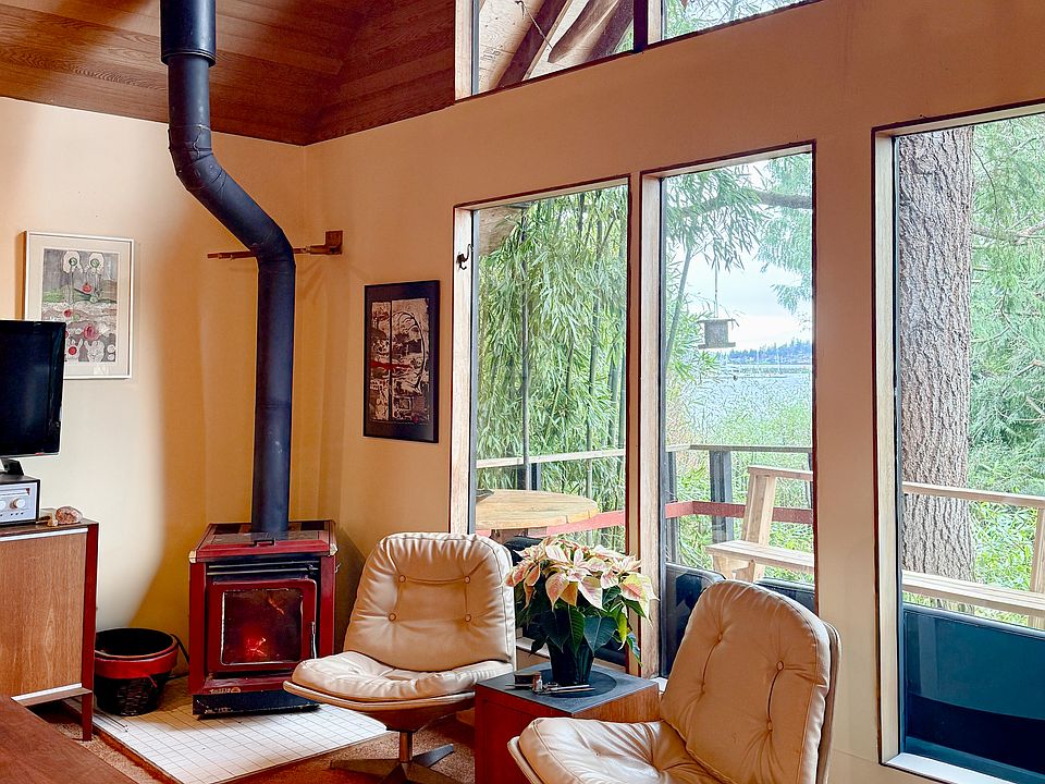 The home is fully furnished with original artwork, two queen beds and mid-century inspired furnishings and appliances