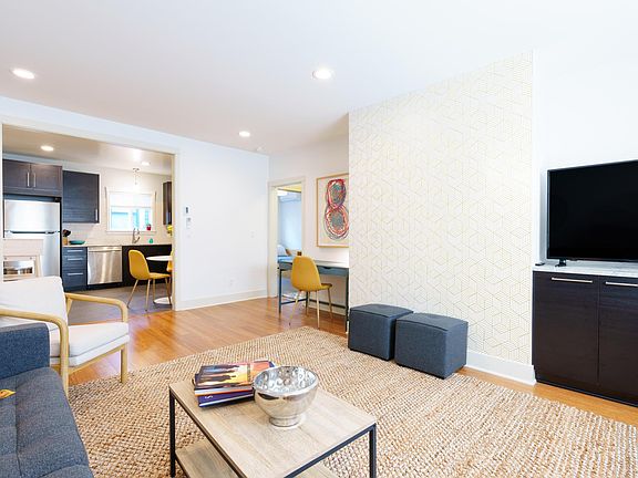 View of loving space into kitchen.