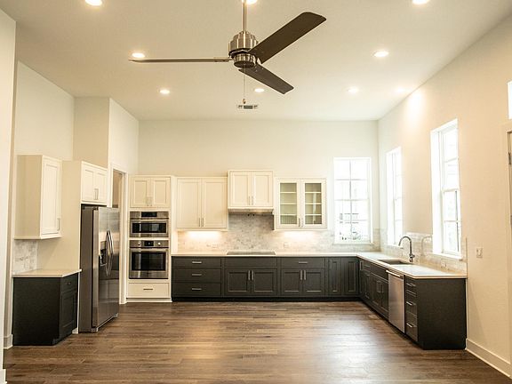 Kitchen with a lot of natural light and space.