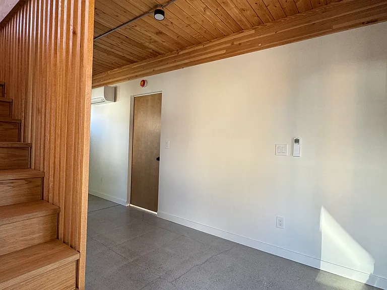 Main floor features polished concrete flooring