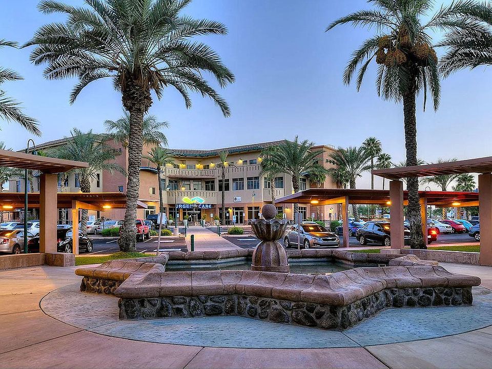 One of two fountains. The one here has a grassy area surrounding it, close to our front door. In rear is SHP "Building One" with great cafes, spas, eateries, barber, medical facilities, entrance to top floor penthouse and units on Campbell overlooking