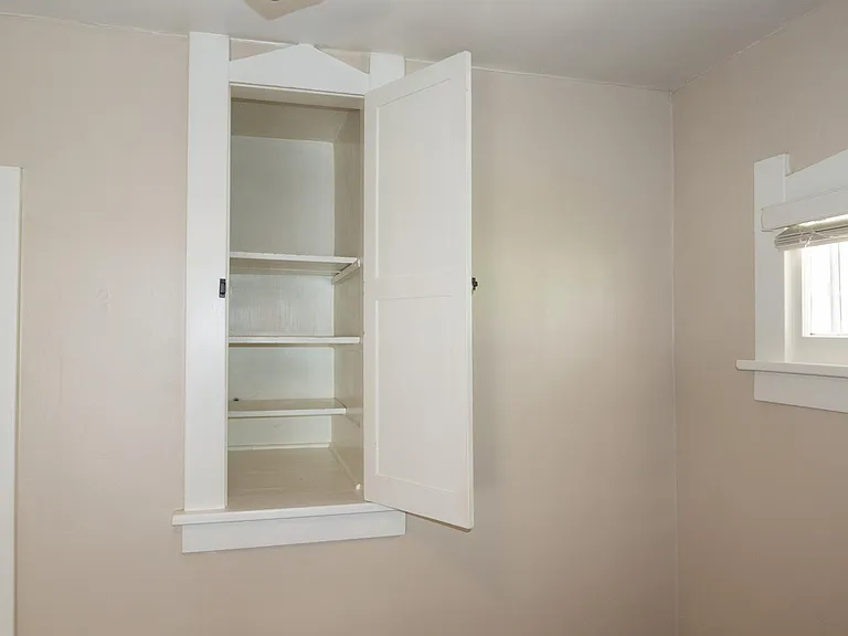 Additional storage closet in the back bedroom.