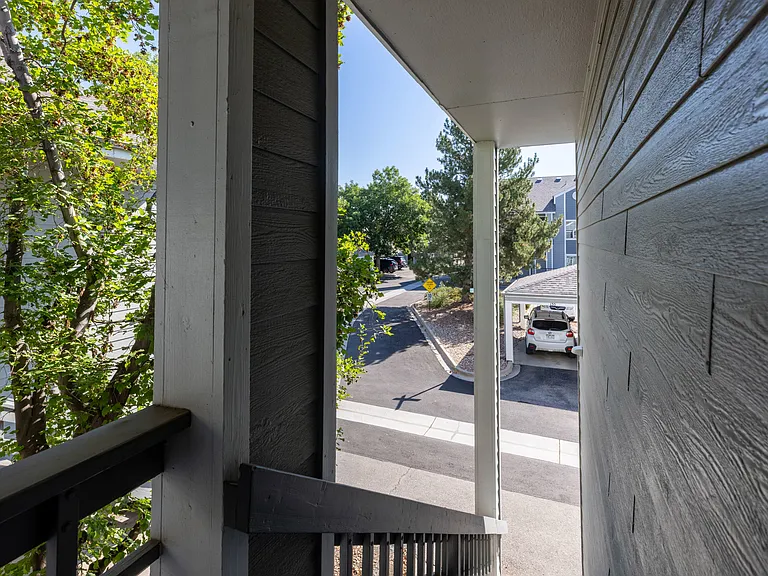 Private entrance providing convenient access from the community parking area.