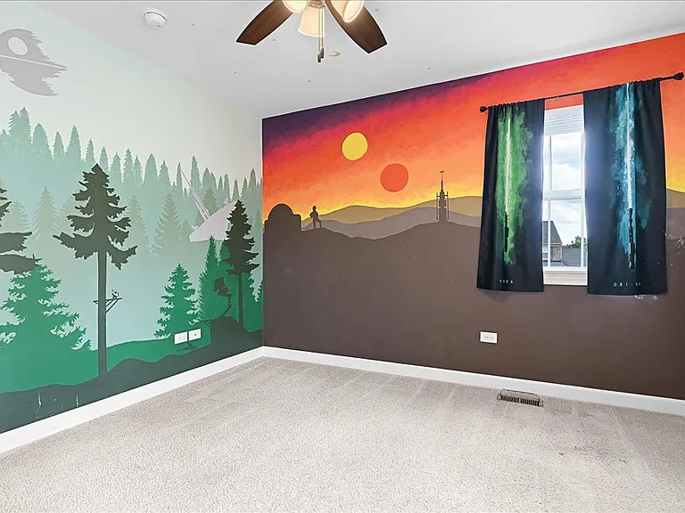 Fourth bedroom, currently painted with Star Wars mural but can be painted neutral color at no cost to new tenant.