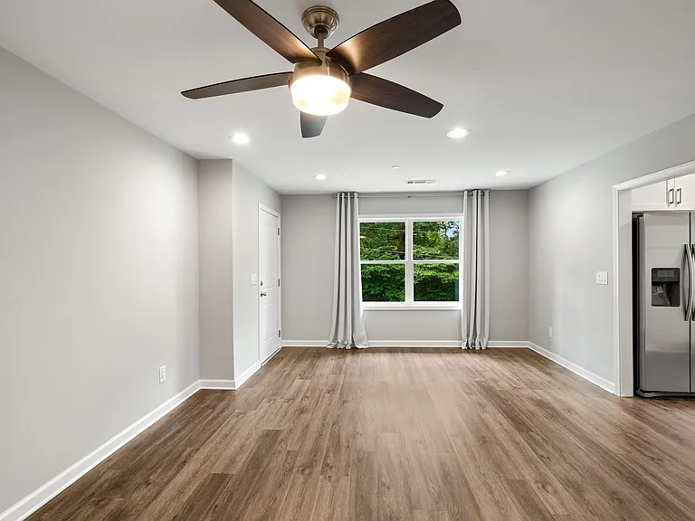 Open-floor living area with gorgeous hard surface floors