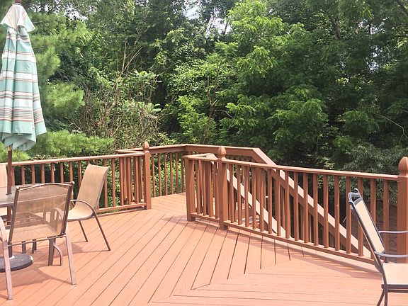 Back Deck with steps leading to back driveway