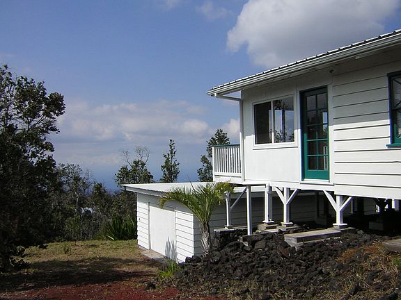 Side view with large garage.
