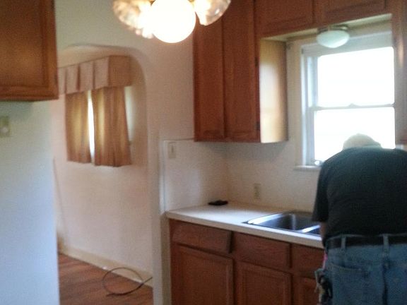 kitchen updates include cabinets,countertop,sink and floorin