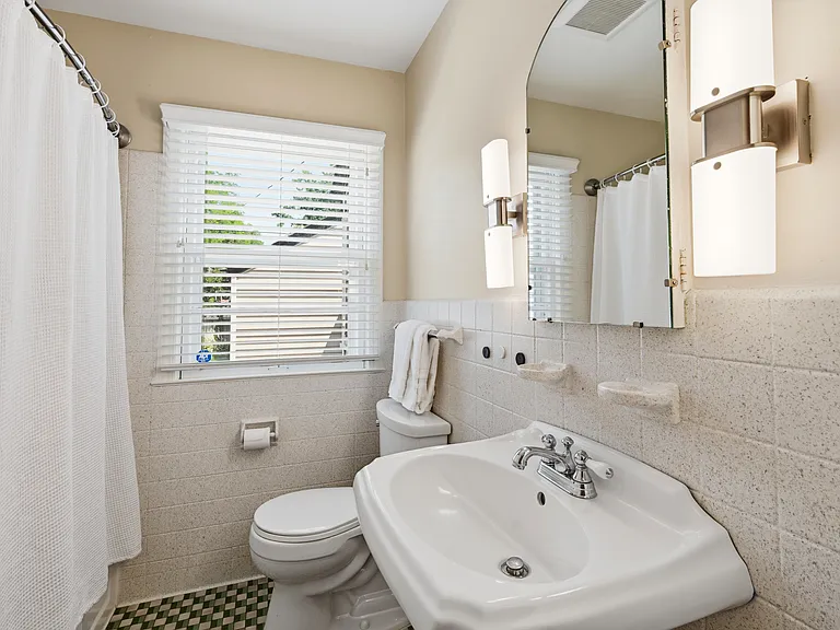 Upstairs bathroom next to master bedroom, across from two additional bedrooms