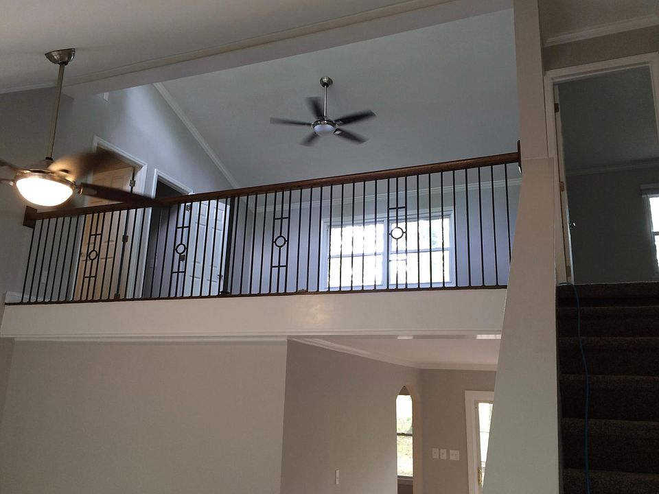 view from living room up to loft