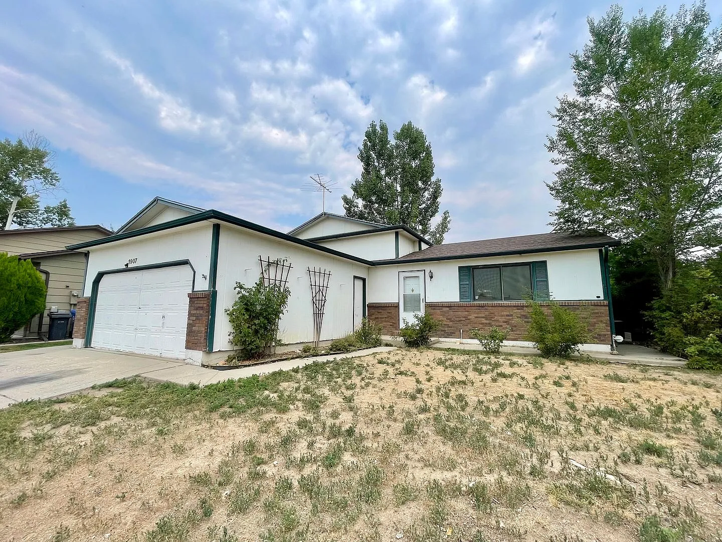 4 Bed, 2 Bath Loveland, CO Home- Fenced Backyard, A/C, & 2 Car Garage! — Photo 3
