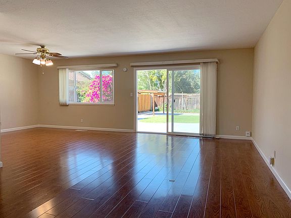 Living Room With Adjacent Dining Room