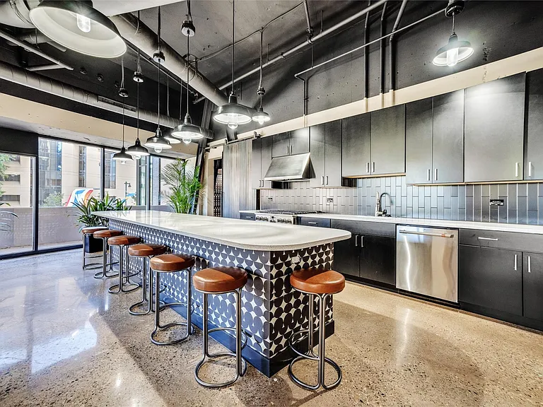 Gourmet kitchen located in resident club room.