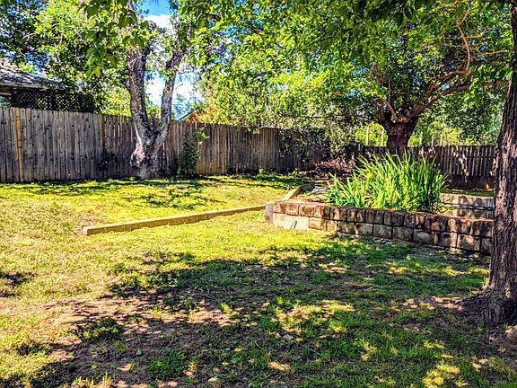Large backyard with Koi Pond