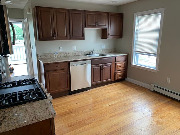 Kitchen - new stainless steel appliances. Room for and island or table and chairs.