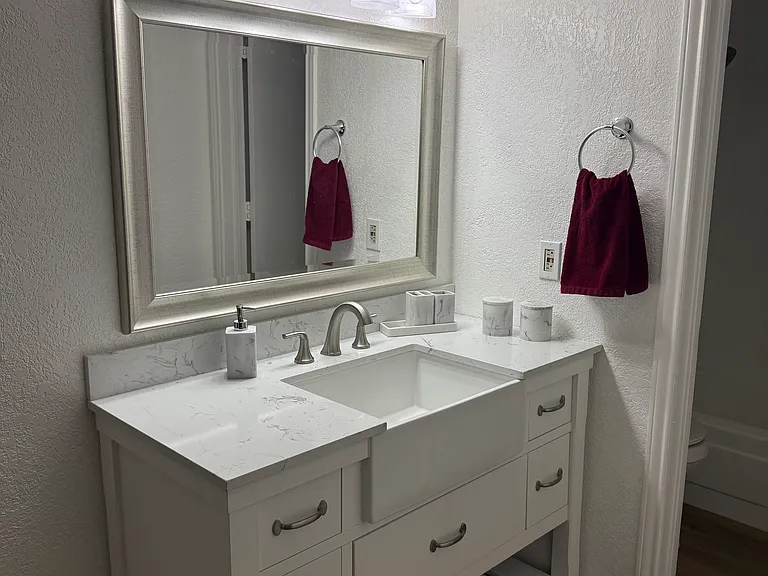 Farmhouse vanity with shelving.