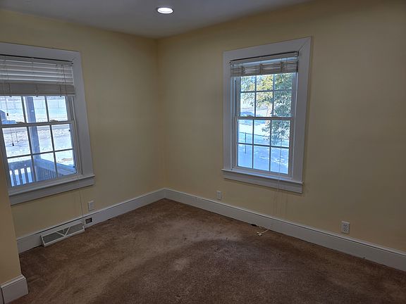 Front Bedroom/Study with blinds and newer windows