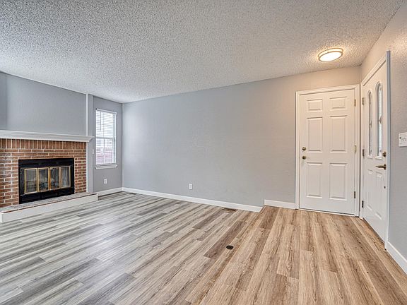 Front Room with real wood-burning fire place.
