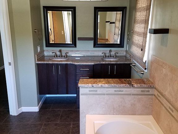 master bath includes soaking tub, walk in shower, and walk i