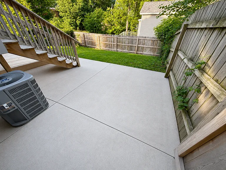 fully fenced backyard with patio and deck!