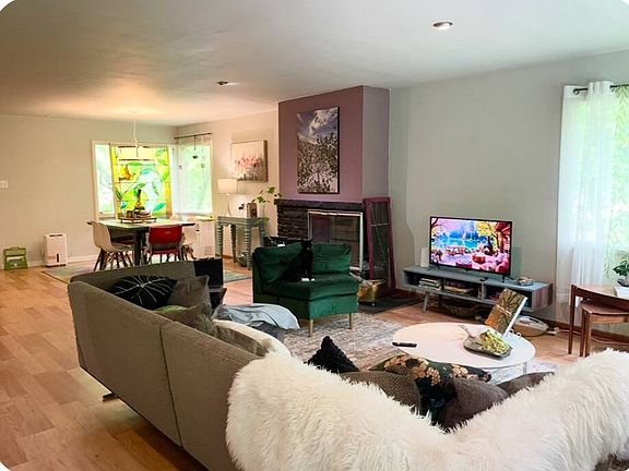 Living room and open floorplan. Furnished unit.