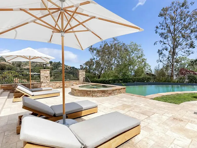 Enjoy some suntanning or a good book on the poolside lounge chairs.