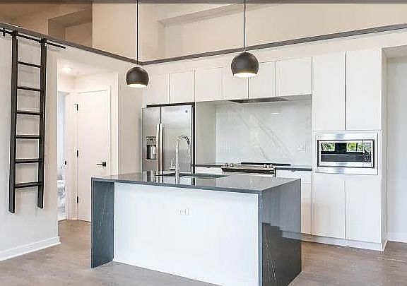 Kitchen and view of loft space
