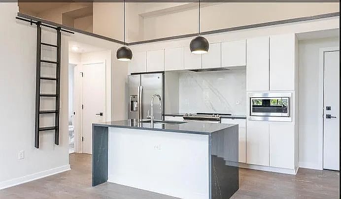 Kitchen and view of loft space