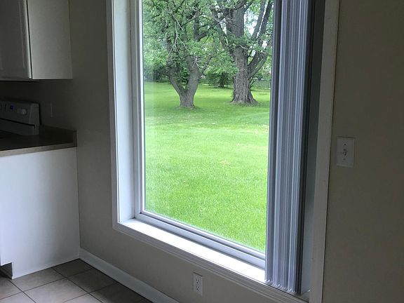Dining room has a nice large window.