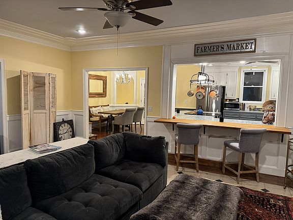 Family room looking toward kitchen and dining