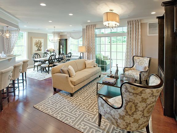 Living Room Opens to Dining and Kitchen