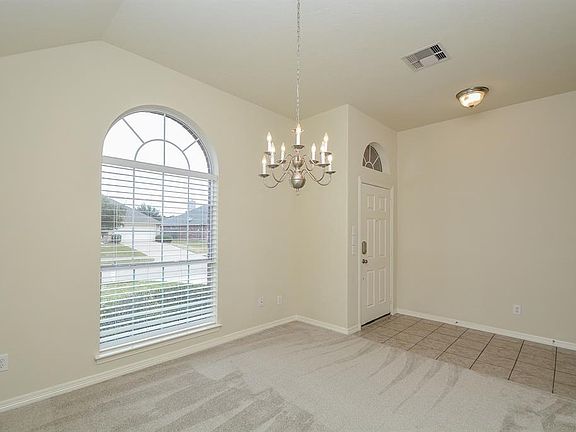 Addl. view of the Dining Room looking out to the front yard.