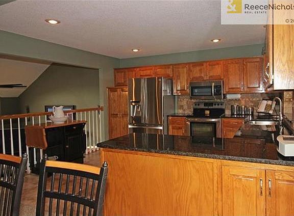 Granite Countertops, Stainless Steal Appliances, Decorative Tile Backsplash