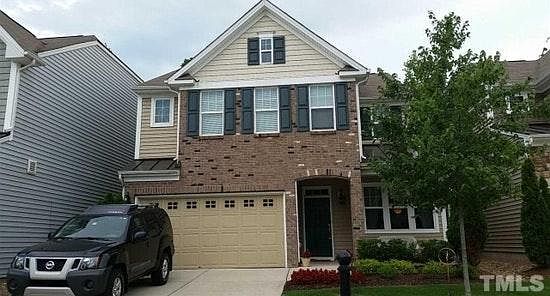 Front of house - no shared walls but connected via storage u