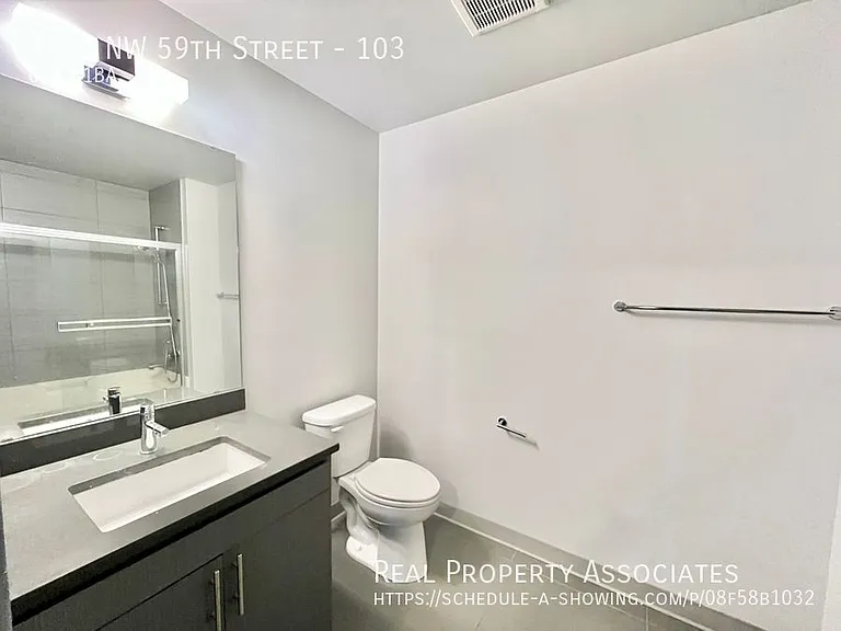 1762 NW 59th St #103 — Photo 7