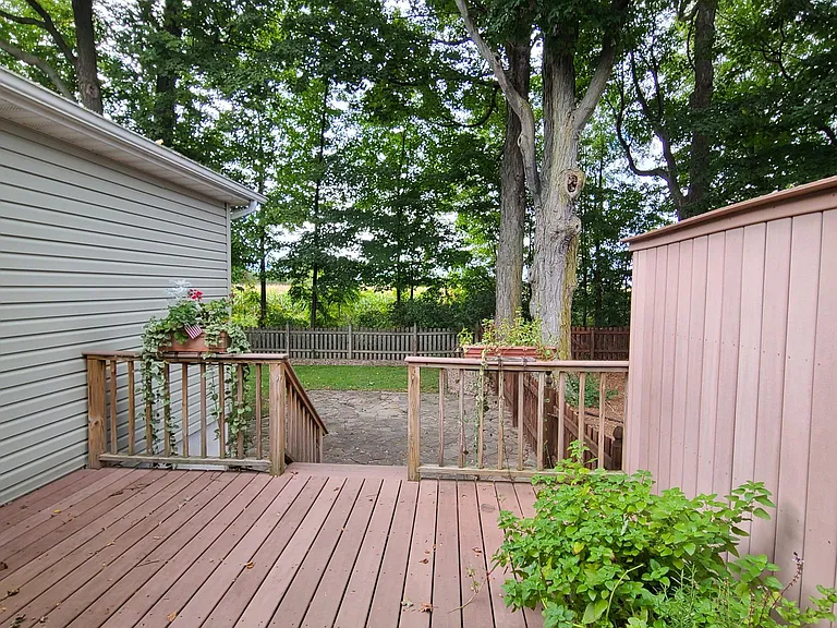 Outdoor deck overlooking patio