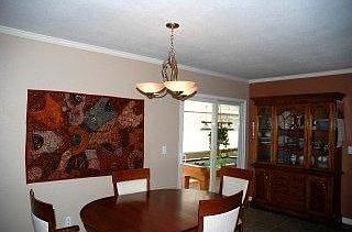 Dining area and into sunroom